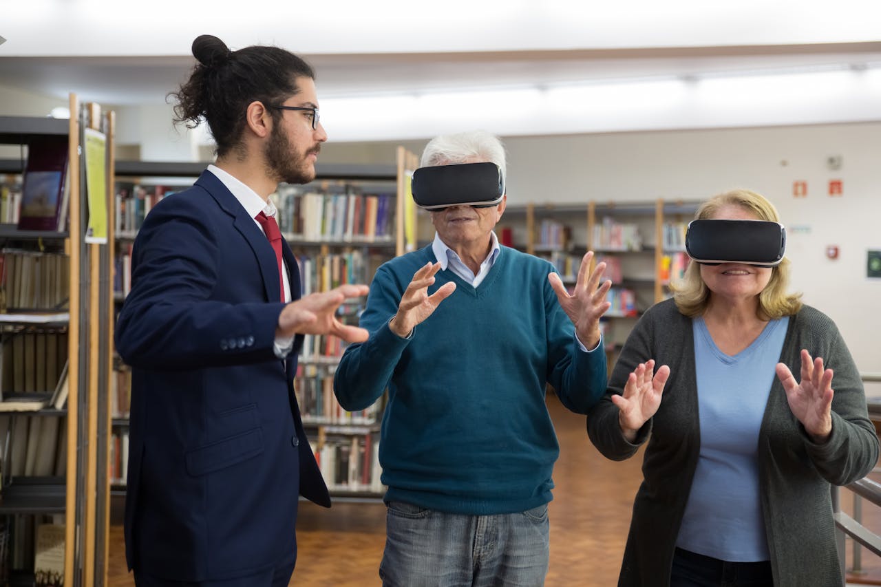 Elderly couple experiencing virtual reality in a modern library setting.
